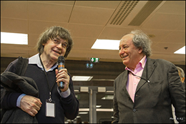 Foto tratta dal sito di Rendez Vous Carnet de Voyage: (credits: Roland Amadon): a destra Michel Renaud, con Cabu, il vignettista di Charlie Hebdo, alla scorsa edizione del festival del Carnet de Voyage