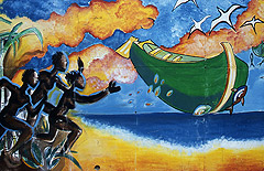 Caraibi Lo sbarco di Cristoforo Colombo sull'isola caraibica in un murales