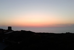 Sardegna Tramonto dalla terrazza dell'hotel Torreruja